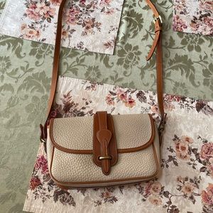 Dooney and Bourke shoulder bag used in great condition. Offers accepted!
